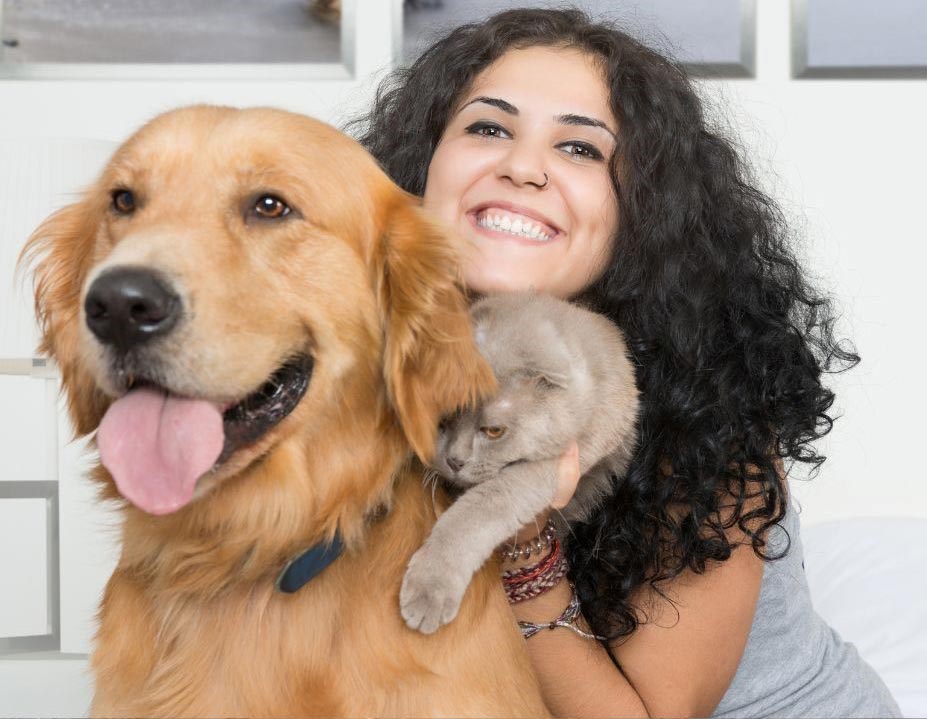 Alice Roy - a passionate writer specializing in pet care and animal welfare - with her Labrador in a happy Mood